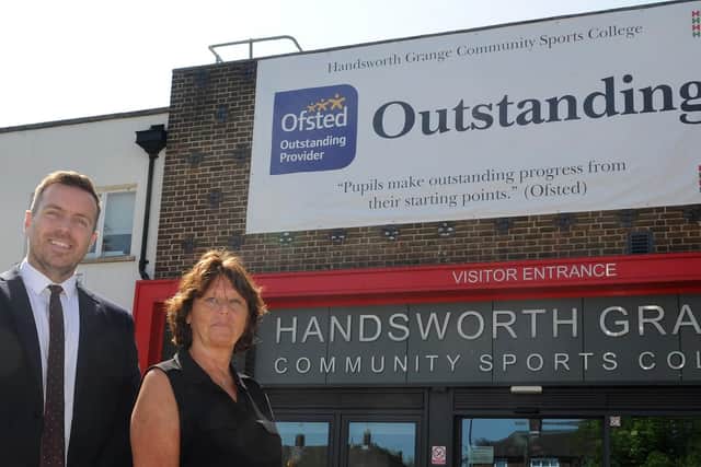 Nick Parker and Anne Quaile with their Ofsted banner at Handsworth Grange Community Sports College