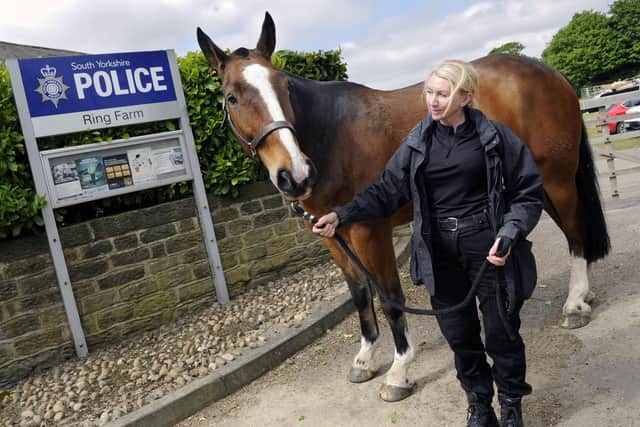 South Yorkshire's police mounted section have moved back to there previous home at Ring Farm,in Cudworth,Barnsley. Pictured is Sgt Katherine Wallis with her police horse Hoober