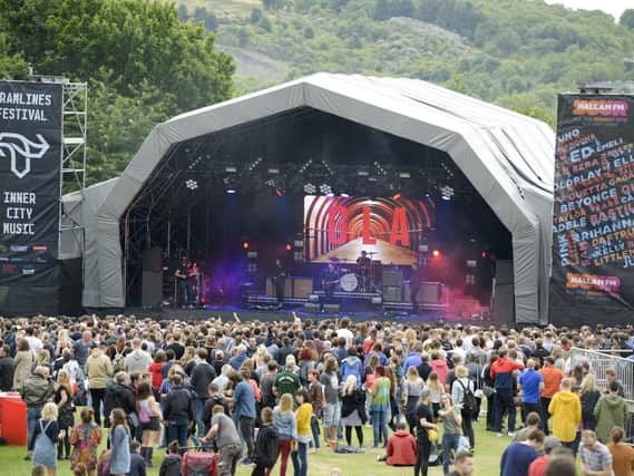 Will the weather be sunny and warm or bleak and grey over the three-day music event?