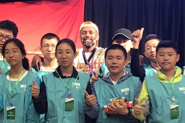 Sheffield lord mayor Magid Magid with competitors at the  2018 UK Regional World Educational Robot (WER) Contest in Sheffield