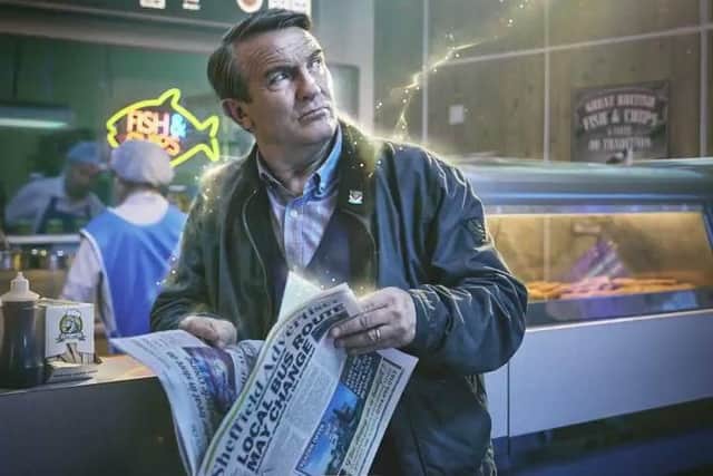 Bradley Walsh reading 'The Sheffield Advertiser' in the publicity photo for the new Doctor Who. (Photo: BBC).
