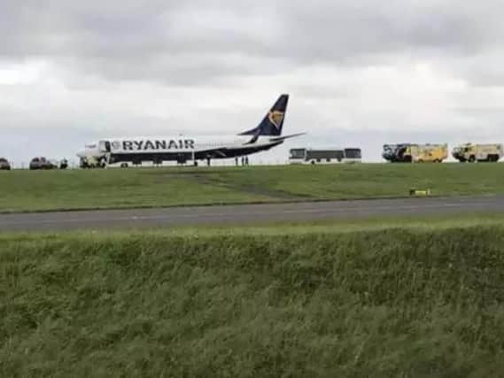 The damaged plane after it had touched down at East Midlands Airport