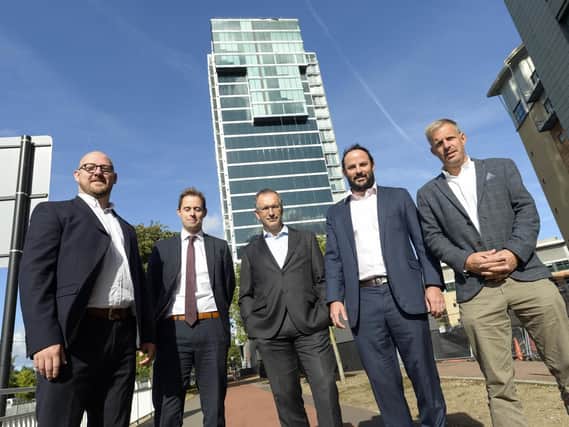 Velocity Tower in Sheffield - the site of a new Ibis Hotel due to open in 2019. Left to right - Nick Fenton of Whittam Cox, senior cost manager Nick Manning of Turner & Townsend, Jon Munce of Queensberry on behalf of Select Group, Alexis Krachai of the Sheffield Property Association and Andrew Davison of Queensberry on behalf of Select. Picture: Dean Atkins