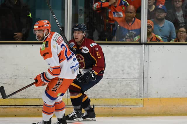 Justin Buzzeo chases the puck at Guildford Flames