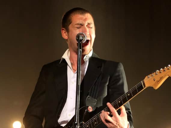 Arctic Monkeys' Alex Turner during their homecoming show at Sheffield Arena last night