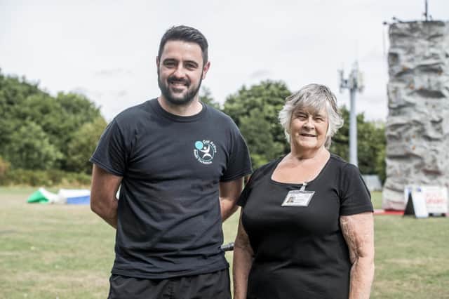 Chancet Wood Neighbourhood Watch coordinator Wendy Zealand with Lee Smith from On The Move, who has run the sports sessions