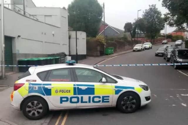 Police officers spent most of yesterday in Hillsborough after a double stabbing