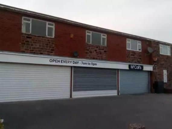 A man was stabbed on the car park outside this convenience store in Aston last night