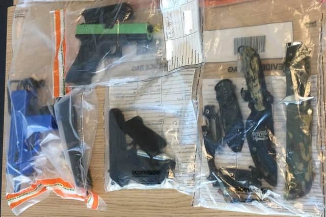 Firearms and knives found during raids in Sheffield.
