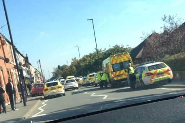 Police and paramedics outside Fir Vale School this afternoon