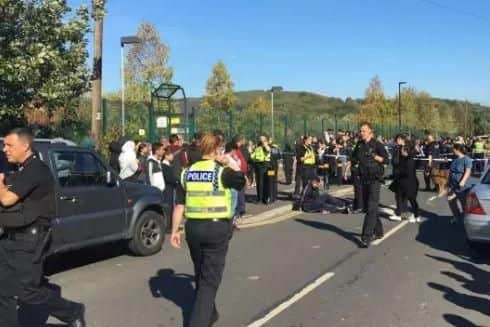 Crowds gathered outside Fir Vale School on Tuesday afternoon after students started fighting