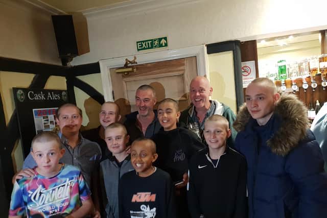 Members of the community joined in with the shave