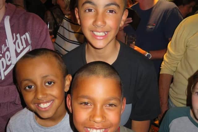 Donte, picture with his best friend Adey (front) and brother Fabian (back)