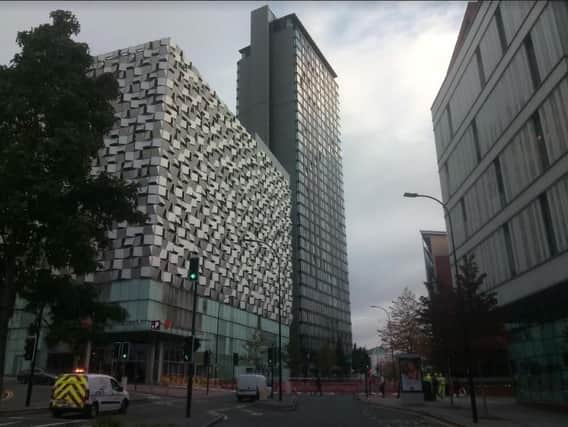 The cladding on the outside of the St Paul's City Lofts tower is being assessed today