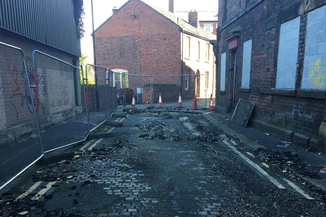 The stretch of ripped out cobblestones on Cornish Street