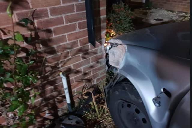 A car crashed into a house on Lupton Road, Lowedges, during a police chase