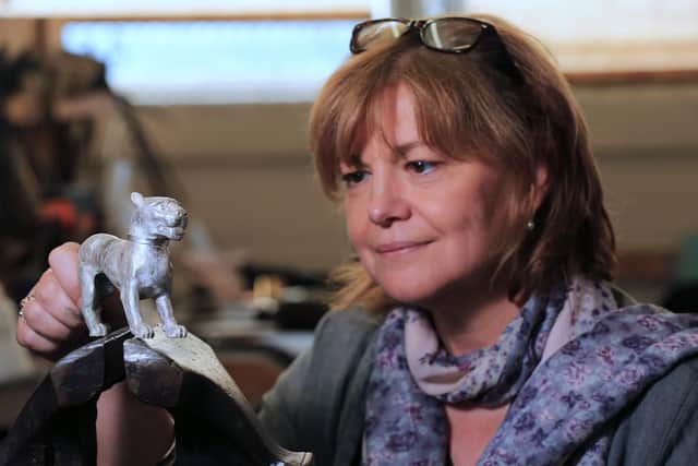 British Silverware managing director Jacqueline Tear with a hand chased silver leopard.