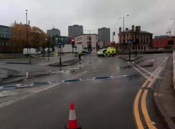 A woman died in a hit-and-run as she crossed a road in Sheffield