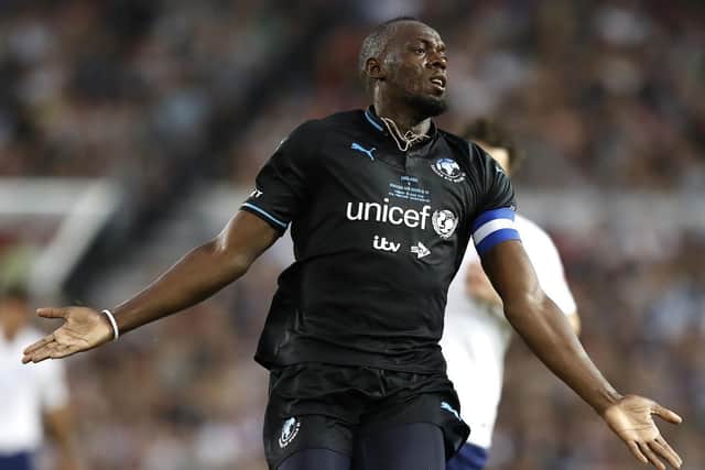 Usain Bolt in action for Soccer Aid