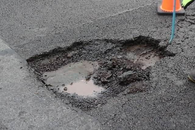 The pothole which opened up between junction 32 and 33 of the M1 northbound. Picture: Highways England.