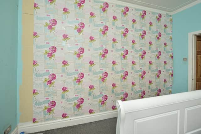 The birdie wallpaper in the old bedroom of Jodie Keegans, 36, who endured years of abuse at the hands of her husband Scott Keegans, 34 - Credit: SWNS