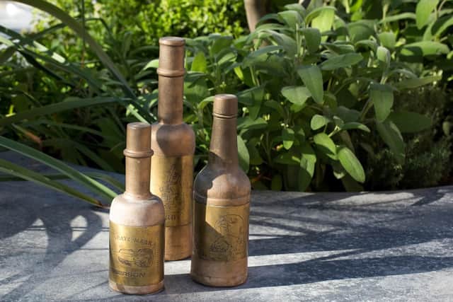 Sculpted Henderson's Relish bottles on the Leavygreave Plantables.
