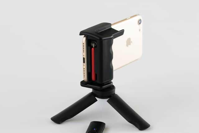 Adonit Photogrip with remote and tripod.