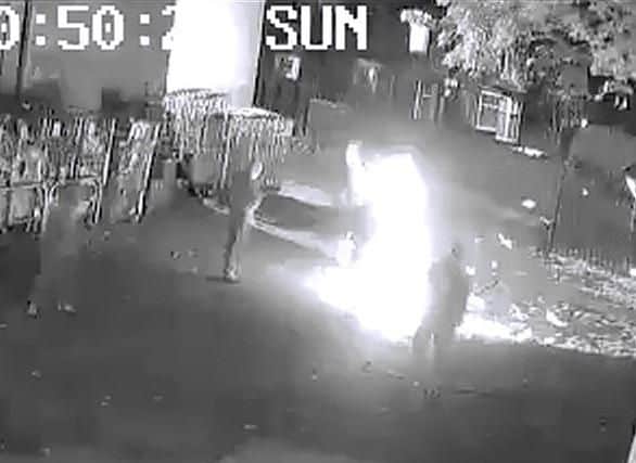 The video, shared on the MRSkyRoom YouTube channel, shows four people starting a fire at the rear of the Tesco store