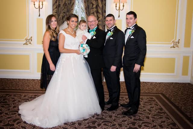 John Gilburn, pictured with wife Rochelle, on his wedding day. Also pictured are his children Maisie, Kirstie, Steven and Daniel.