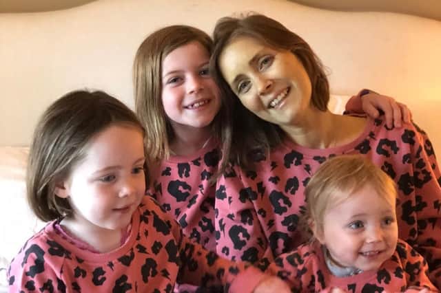 Jenny Walker and her three girls, six-year-old Nia, four-year-old Cora and one-year-old Beth.