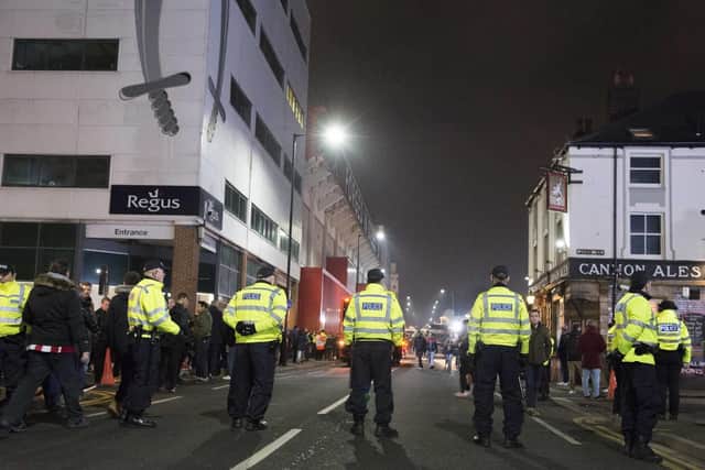 Police officers outside Bramall Lane at the last Sheffield derby