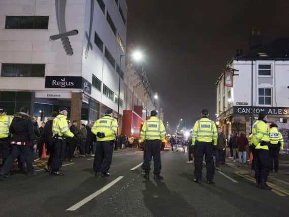 Police officers outside Bramall Lane at the last Sheffield derby