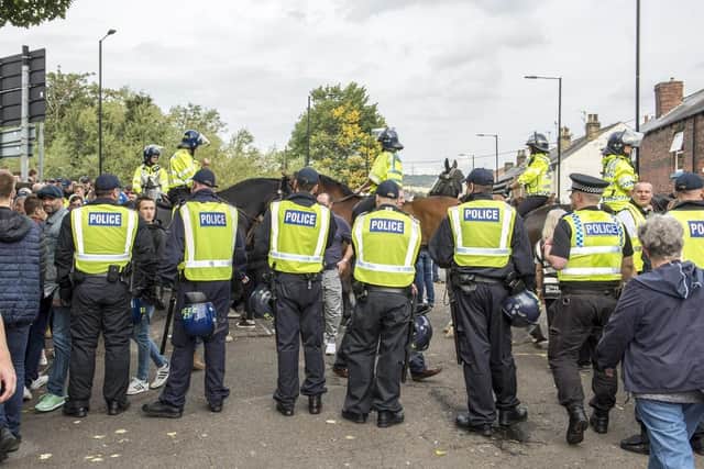 Police officers on duty at the Steel City derby in Hillsborough last season