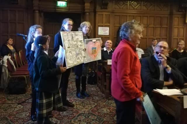 Sue Pearson presented the petition with children from Sheffield Youth Equality Group