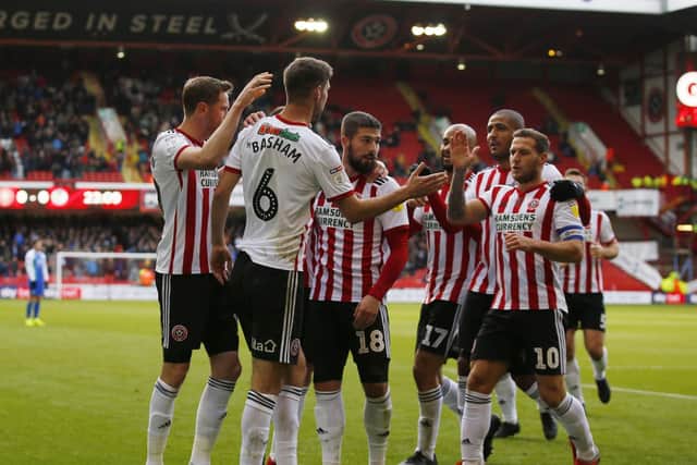 Chris Basham of Sheffield Utd is congratulated following the first goal during the Sky Bet Championship match at Bramall Lane Stadium, Sheffield. Picture date 27th October 2018. Picture credit should read: Simon Bellis/Sportimage