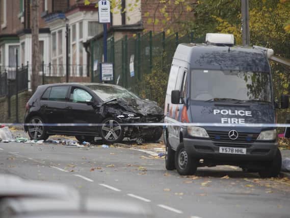 Police at the scene of the fatal collision on Main Road in Darnall