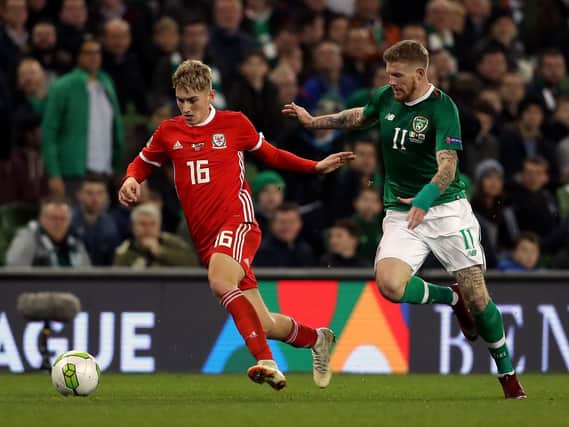 Wales's David Brooks (left) and Republic of Ireland's James McClean (right) battle for the ball during the UEFA Nations League, League B, Group four match at The Aviva Stadium, Dublin: Liam McBurney/PA Wire.