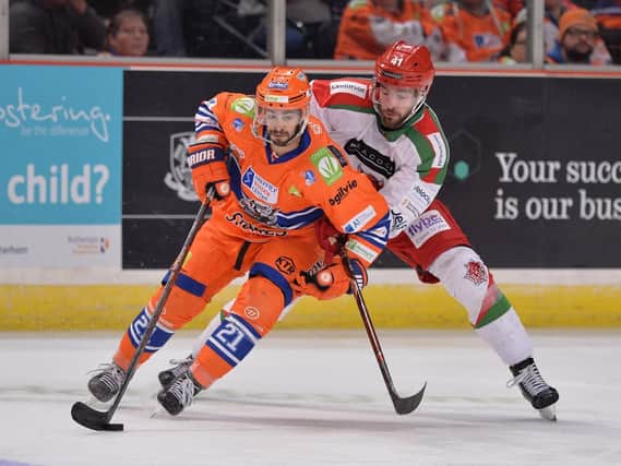 Sheffield Steelers player Justin Buzzeo in action against Cardiff Devils