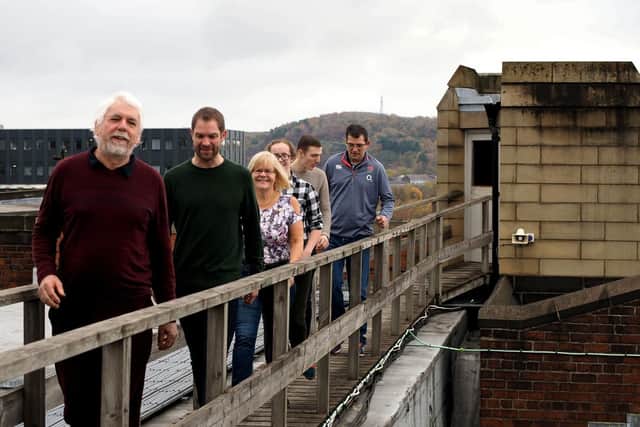 Bellringers at Sheffield Cathedral: making their way over the Cathedral roof to the bell tower