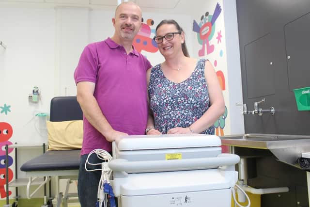 Sally and Sean Dexter with the new ECG machine.