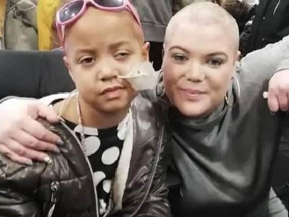 Terneesha with her mum Joanne, after she shaved her head at the Little Princesses Trust fundraiser