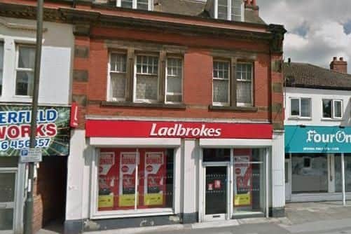 A robber escaped with cash from a bookmakers in Chesterfield
