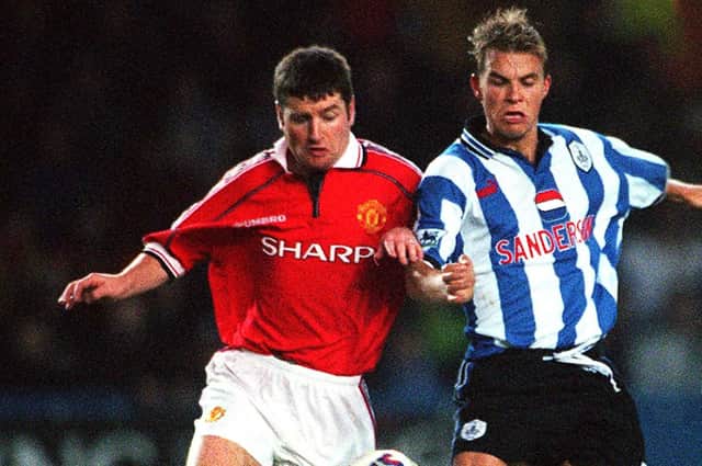 Sheffield Wednesday's Niclas Alexandersson battles it out with Utds denis Irwin
Sheffield Wednesday v Manchester United