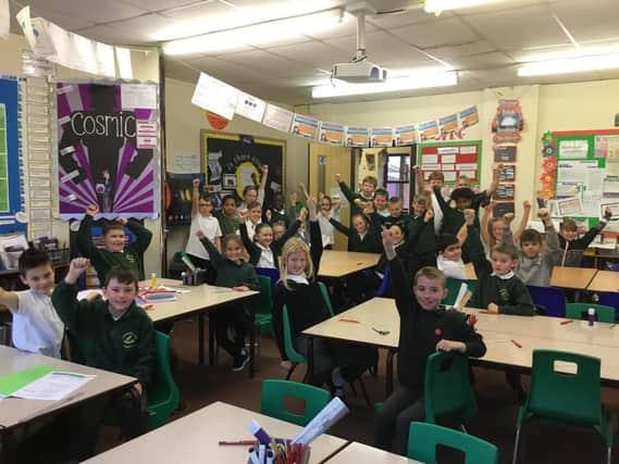 Year five pupils at Greengate Lane Academy, in High Green celebrate the Ofsted report