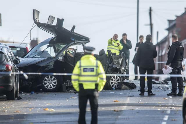 Police officers are often forced to close roads following collisions