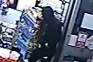 A CCTV image of a robber who raided a shop in Maltby