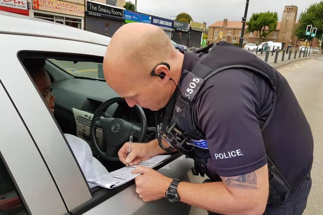 Police catching a driver - Credit: West Midlands Police