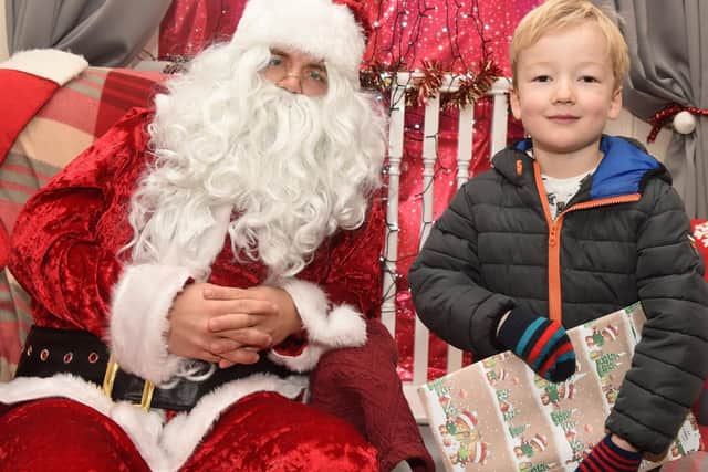 Gabriel Sushams meets Santa at the Whirlow Hall Farm Christmas Fayre