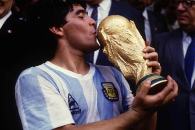 Diego Maradona lifts the World Cup in 1986.
