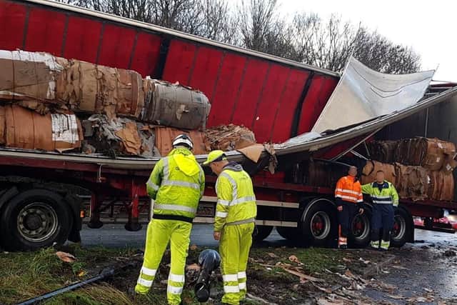 An overturned lorry on an M1 slip road near Rotherham caused disruption for motorists yesterday